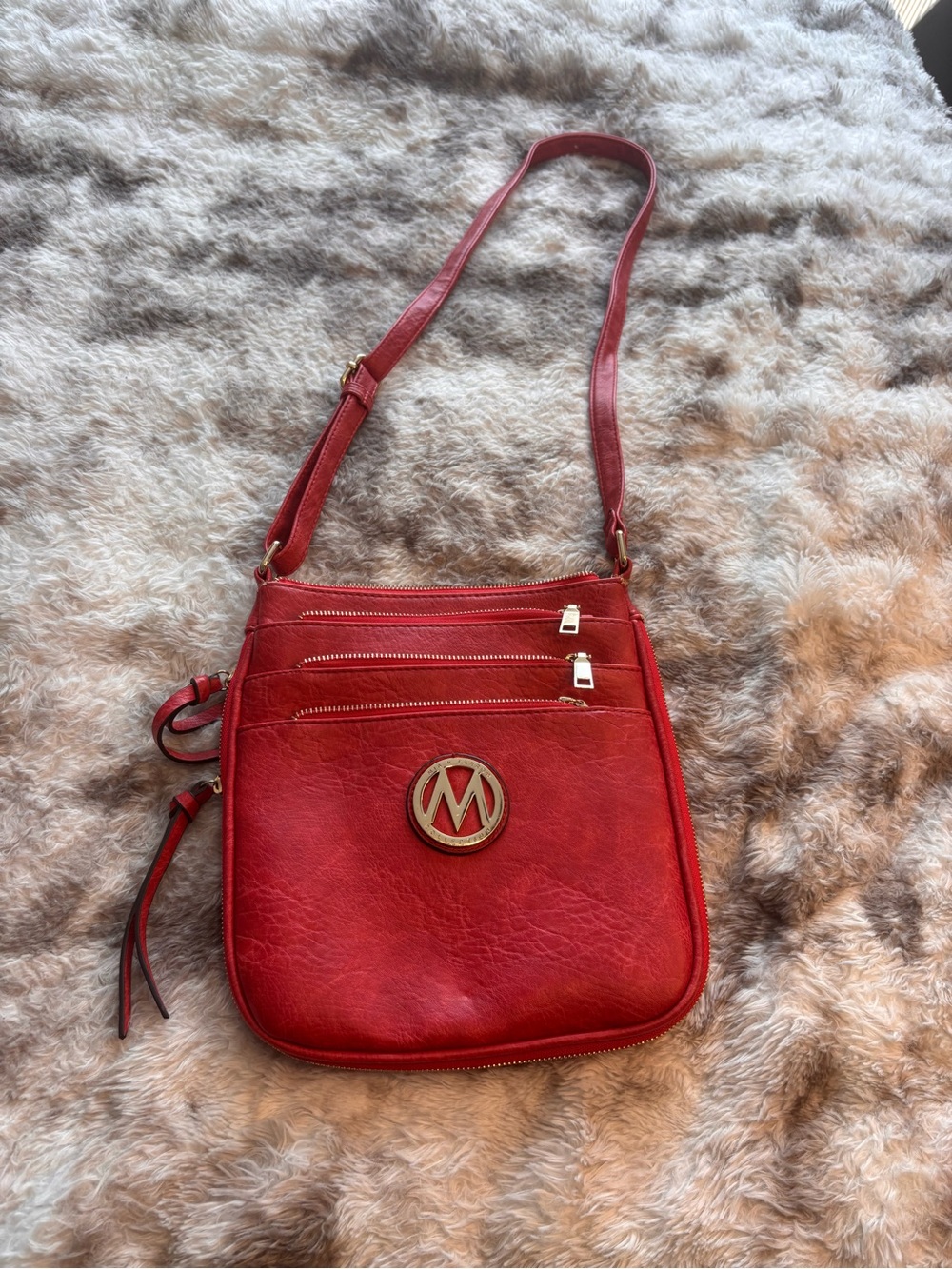 Red Crossbody Bag with Circular Logo Accent